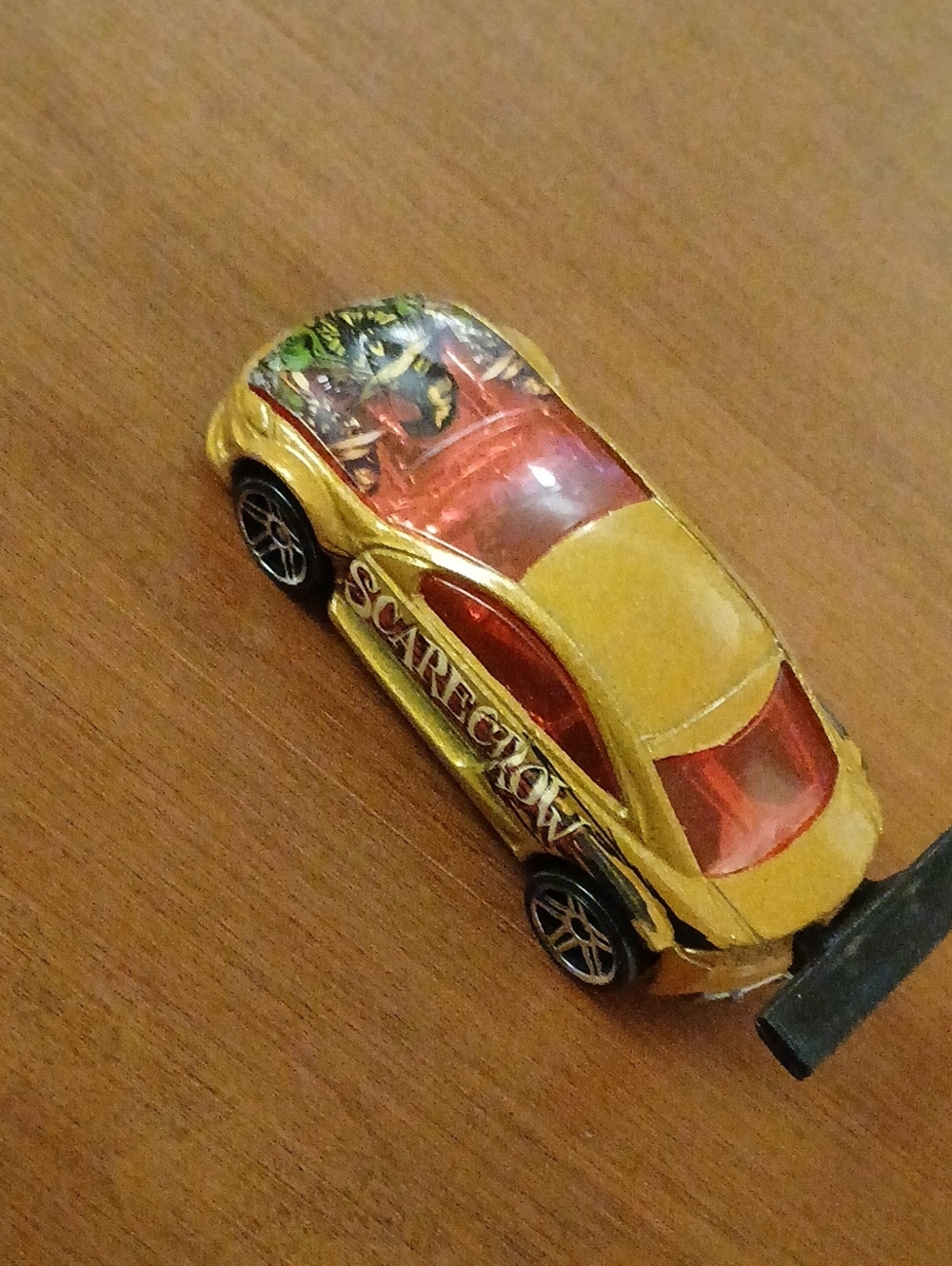 2001 Hot Wheels Gold Scarecrow Cougar Collectible Car